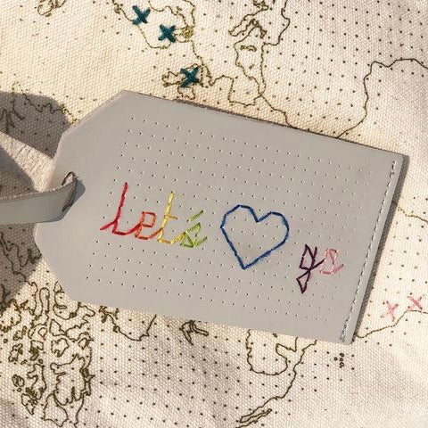 Stitch your own luggage tag